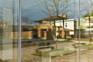 American Reflections shows a 35mm digital colour photo of reflections of a Frank Lloyd Wright house in large glazed windows in Buffalo.