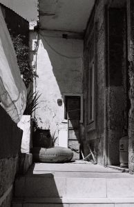 Quite Spaces shows a 35mm black and white film photo of a derelict building in Sliema, Malta