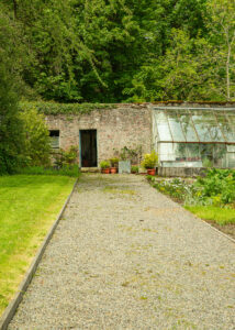 Irish Gardens shows a 35mm digital colour photo image of another path in the formal walled garden of Russborough House, Co Wicklow