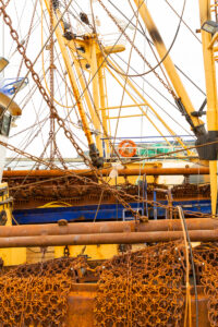 Sea Fever show a 35mm digital colour photographic close-up detail of a fishing boat in the harbour at Howth in Co Dublin