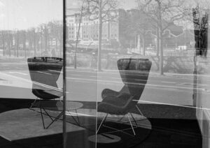 Dublin Dockland's reflections contain digital images in black and white of reflections seen in the Liffey river and windows of buildings in the area.