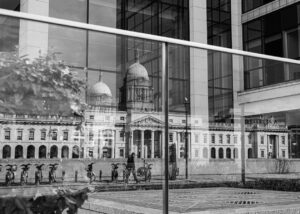 Dublin Dockland's reflections contain digital images in black and white of reflections seen in the Liffey river and windows of buildings in the area.