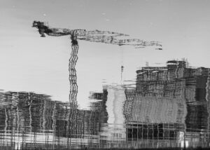 Dublin Dockland's Reflections contain 35mm digital images in black and white of reflections seen in the Liffey river and windows of buildings in the area.