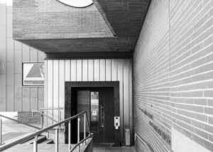 A black and white digital photographic image of a building taken during a stroll through the Dublin Docklands' area.