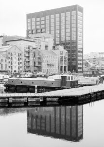 Dublin Dockland's reflections contain digital images in black and white of reflections seen in the Liffey river and windows of buildings in the area.