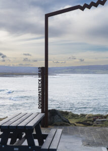 Mayo, Ireland shows an image of a seating area and notice at Downpatrick Head, Co mayo, Ireland