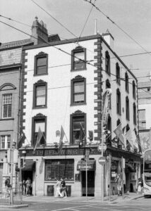 Recent Photos shows a 35mm B&W film image of a Dublin pub, 'The Flowing Tide'