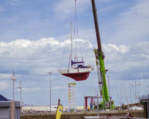 Recent additions shows a 35mm colour film image of a yacht on its way into the harbour on a bright sunny day in Dun Laoghaire