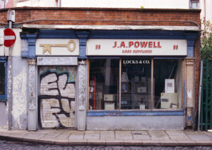 New Photos shows a 35mm colour film photo image of a shop in Dublin City